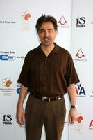 Joe Mantegna arriving at the National Kidney Foundation Celebrity Golf Classic at the Lakeside Lakeside Golf Club in Burbank CA onMay 4 photo