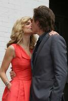 Kyra Sedgwick  Kevin Bacon at the presentation of a Star on the Hollywood Walk of Fame to Kyra Sedgwick in Hollywood  CA on June 8 2009 photo