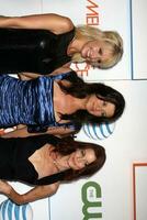 Josie Bissett Daphne Zuniga and Laura Leighton arriving at Melrose Place Premiere Party on Melrose Place in Los Angeles CA on August 22 2009 photo