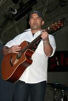 Matt Stillwell performing at the ACM Showcase on Fremont Street in Las Vegas NV on April 3 2009 photo