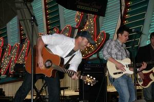 Matt Stillwell performing at the ACM Showcase on Fremont Street in Las Vegas NV on April 3 2009 photo
