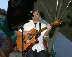 Matt Stillwell performing at the ACM Showcase on Fremont Street in Las Vegas NV on April 3 2009 photo