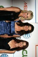 Josie Bissett Daphne Zuniga and Laura Leighton arriving at Melrose Place Premiere Party on Melrose Place in Los Angeles CA on August 22 2009 photo