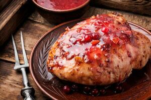 Chicken breasts with cranberry sauce photo