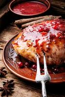 Chicken breasts with cranberry sauce photo