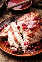 Chicken breasts with cranberry sauce photo