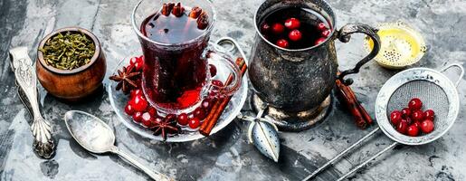 Hot tea with cranberry photo