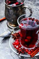 Hot tea with cranberry photo