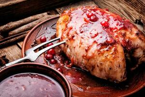 Chicken breasts with cranberry sauce photo