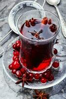 Hot tea with cranberry photo