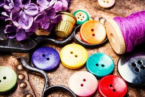 Thread and sewing buttons photo