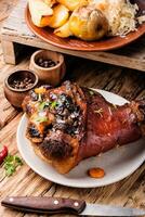 Roasted pork knuckle with spices photo