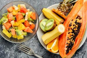 Bowl of healthy fresh fruit salad photo