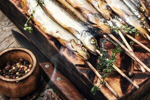 Smoked fish in a smoker photo