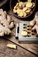 Whole and sliced ginger photo