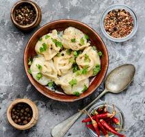 Ukrainian pelmeni on plate photo