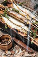 Smoked fish in a smoker photo