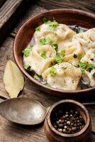 Ukrainian pelmeni on plate photo