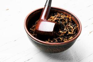 Smoking tobacco pipe photo