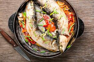 Tasty baked whole fish photo