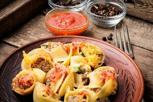 Pasta stuffed with meat photo