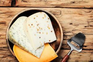 Delicious cheese on the table photo