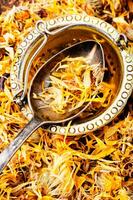 Dried calendula flowers photo