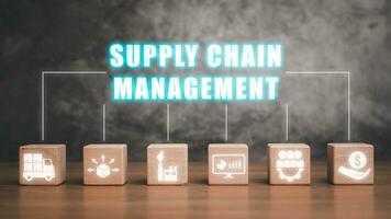 Supply chain management concept, Wooden blok on desk with supply chain management icon on virtual screen. photo