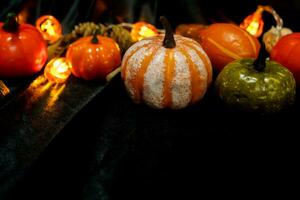 Halloween decorations background. Halloween Scary pumpkin head on wooden table Halloween holiday concept photo