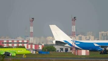 NOVOSIBIRSK, RUSSIAN FEDERATION JUNE 17, 2020 Commercial plane Embraer E170, VQ BYK of S7 Airlines taxiing at Tolmachevo Airport, Novosibirsk video