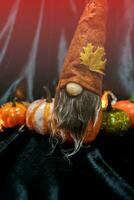 Halloween decorations background. Halloween Scary pumpkin head on wooden table Halloween holiday concept photo