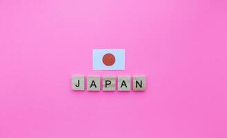 February 11, National Foundation Day, flag of Japan, minimalistic banner with wooden letters photo