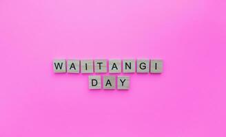 February 6, Waitangi day, a minimalistic banner with an inscription in wooden letters photo