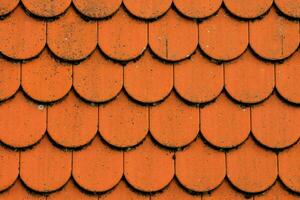 an orange roof with many different shapes photo