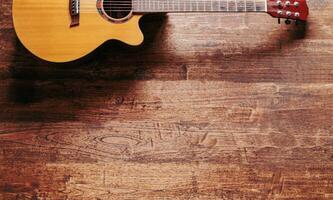 classical guitar on wooden background photo