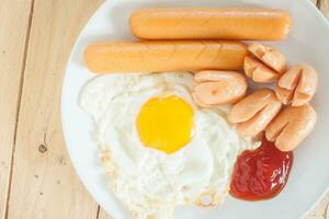 breakfast fried egg sausage photo