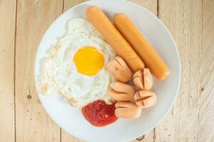 breakfast fried egg sausage photo