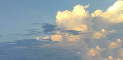 a blue sky with clouds and a few clouds, Blue sky, white cloud time lapse of clouds in the sky, the sun shines through the clouds in this photo, dramatic sky clouds photo