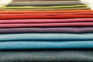 a stack of colorful fabric photo