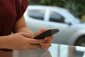 Female hand using phone, social concept photo