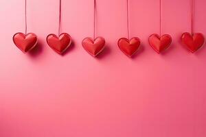 San Valentín día antecedentes con rojo corazones en rosado fondo, rojo papel cortar corazones colgando en rosado fondo, ai generado foto