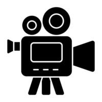 A solid design icon of video camera vector