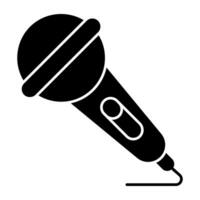 Icon of singing mic in solid design vector