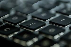 Modern computer keyboard with f button, close-up. Press f concept photo