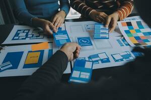 ux Graphic designer creative sketch planning application process development prototype wireframe for web mobile phone . User experience concept. photo