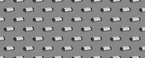 Horizontal seamless pattern. Rolls of garbage bags isolated on gray background. On the roll white copy space. photo