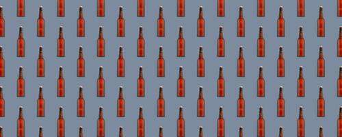 Seamless pattern of misted beer bottles on gray background. photo