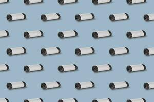 Horizontal seamless pattern. Rolls of garbage bags isolated on blue background. On the roll white copy space. photo