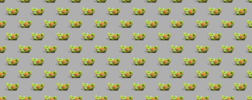 Fresh vegetables in a metal shopping cart. Seamless pattern of shopping baskets isolated on gray background. photo