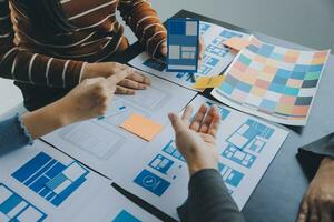 ux Graphic designer creative sketch planning application process development prototype wireframe for web mobile phone . User experience concept. photo